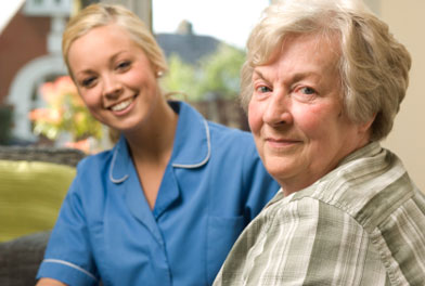 image of elderly woman with health care assistant